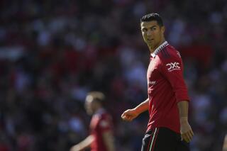 Manchester United's Cristiano Ronaldo looks on, during a pre-season friendly match between Manchester United and Rayo Vallecano, at Old Trafford, Manchester, Sunday July 31, 2022. (Dave Thompson/PA via AP)