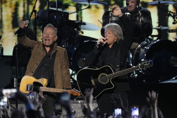 Bruce Springsteen, left, and Jon Bon Jovi perform during MusiCares Person of the Year honoring Jon Bon Jovi on Friday, Feb. 2, 2024, in Los Angeles. (APPhoto/Chris Pizzello)