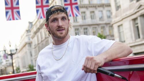 FILE - Logan Paul promotes an energy drink on an open top bus traveling through London, Friday, June 17, 2022. Logan Paul has 25 1/2 million Instagram followers and a spot in WWE's main event on Saturday's card in Saudi Arabia. (AP Photo/Scott Garfitt, File)