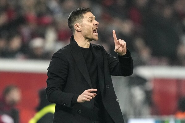 Xabi Alonso taking Bayer Leverkusen to unprecedented heights in Bundesliga  | AP News