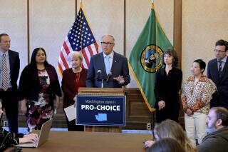 Washington Gov. Jay Inslee speaks during a press conference, Tuesday, April 4, 2023, at the state Capitol in Olympia, Wash. The state of Washington has stockpiled a three-year supply of an abortion pill in anticipation of a court ruling that could limit its availability, Inslee announced Tuesday. (Steve Bloom/The Olympian via AP)