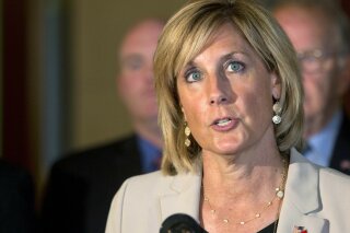 FILE - In this June 10, 2015 file photo, assemblywoman Claudia Tenney, R-New Hartford, speaks during a news conference at the Capitol, in Albany, N.Y. A New York judge ruled Friday that Republican Claudia Tenney defeated US Rep. Anthony Brindisi by 109 votes in last open race. (AP Photo/Mike Groll, File)