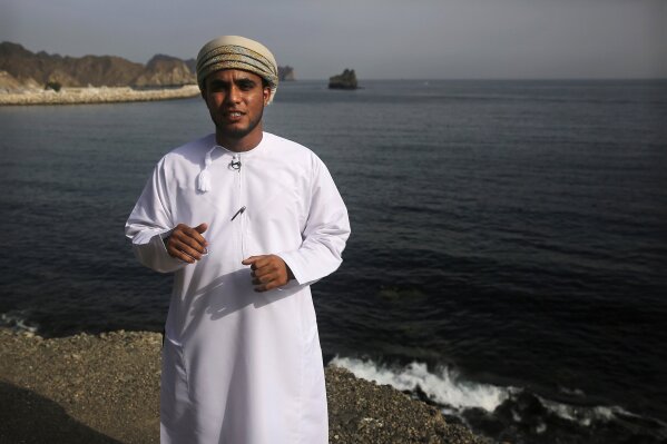 
              In this Feb. 26, 2017 photo, marine ecologist Ahmad al-Alawi, 26, warns, during an interview on the cliffs above the marina of Bandar al-Rowdha, Oman, that a reoccurring and expanding algae bloom, stretching from India to Oman, threatens the entire marine ecosystem. He says the blooms are growing bigger and lasting longer, displacing the zooplankton at the bottom of the local food chain. (AP Photo/Sam McNeil)
            