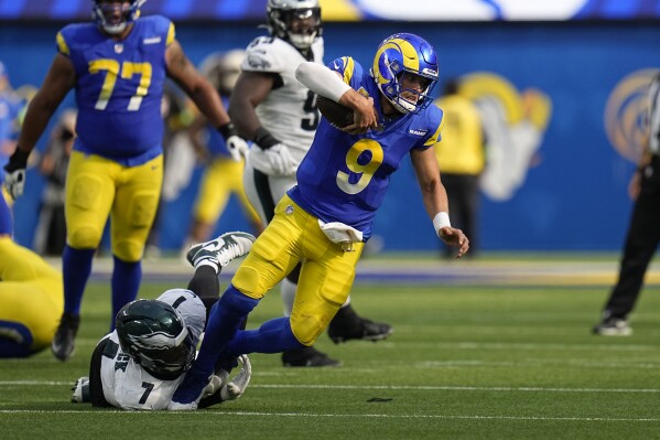 The Rams hung with the Eagles early, but couldn't recover after giving up a TD  before halftime | AP News