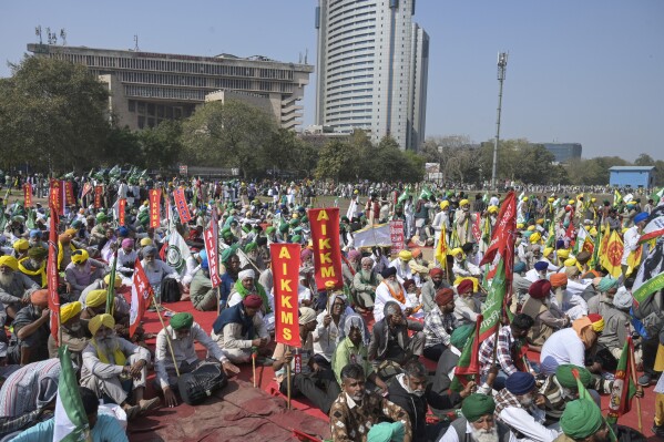 Indian farmers who have been protesting to demand guaranteed crop prices gather at Ramlila ground in New Delhi, India, Thursday, March 14, 2024. (AP Photo)