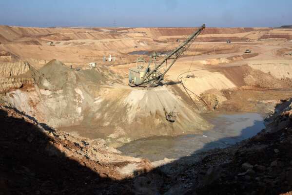 An ilmenite open pit mine is seen in a canyon in the central region of Kirovohrad, Ukraine, Feb. 12, 2025. (AP Photo/Efrem Lukatsky, File)