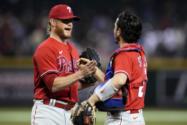 Phillies back Walker with 3 HRs, beat A's for 4th straight win