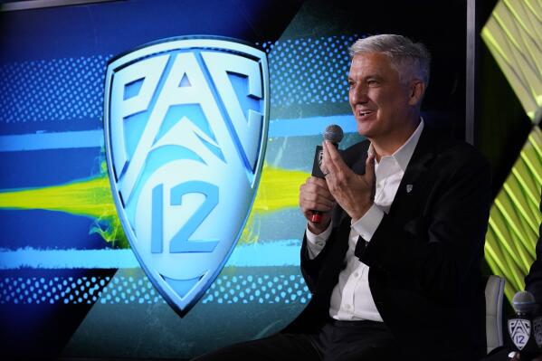 Pac-12 Commissioner George Kliavkoff fields questions during the Pac-12 Conference NCAA college football Media Day Tuesday, July 27, 2021, in Los Angeles. (AP Photo/Marcio Jose Sanchez)