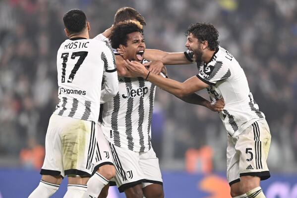 Juventus' Weston McKennie, center, celebrates after scoring his side's second goal of the game during the Italian Serie A soccer match between Juventus and Empoli at the Juventus Stadium in Turin, Italy, Friday, Oct. 21, 2022. (Fabio Ferrari/LaPresse via AP)