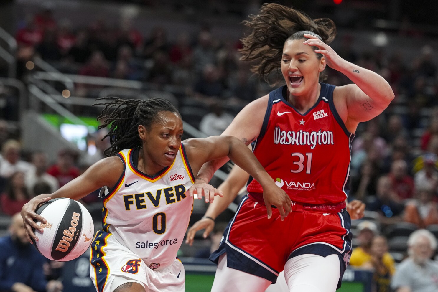 Kelsey Mitchell scores 23 and the Fever _ without Caitlin Clark -- beat the Mystics 85-76