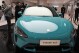 Visitors to the Xiaomi Automobile flagship store look at the Xiaomi SU7 electric car on display in Beijing, Tuesday, March 26, 2024. Xiaomi, a well-known smart consumer electronics brand in China, is joining the country's booming but crowded market for electric cars. (AP Photo/Ng Han Guan)
