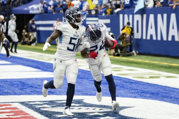 Tennessee Titans cornerback Elijah Molden (24) celebrates a touchdown on an interception with linebacker David Long (51) in the second half of an NFL football game against the Indianapolis Colts in Indianapolis, Sunday, Oct. 31, 2021. (AP Photo/AJ Mast)