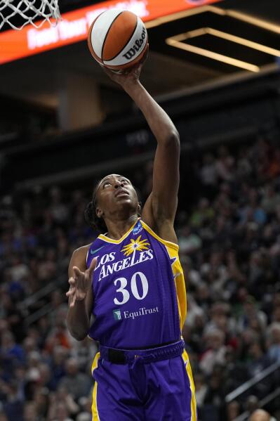 Los Angeles Sparks guard Lexie Brown (4) poses during media day
