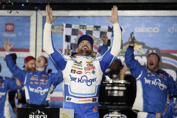 Ricky Stenhouse Jr. celebrates in Victory Lane after winning the NASCAR Daytona 500 auto race at Daytona International Speedway, Sunday, Feb. 19, 2023, in Daytona Beach, Fla. (AP Photo/John Raoux)