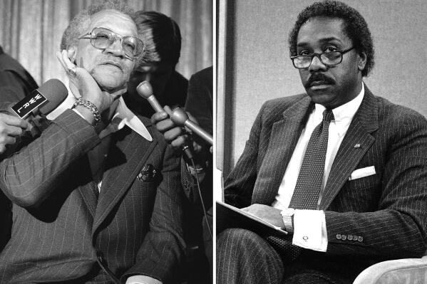This combination photo shows Comedian Redd Foxx, left, speaking to journalists about the reasons he left the top-rated sitcom "Sanford & Son," March 14, 1974 in New York and actor Demond Wilson participating in a CBS "Face the Nation" discussion on school prayer on May 5, 1984, in Washington. It was 50 years ago this month that the sitcom “Sanford and Son” debuted on NBC. (AP Photo)