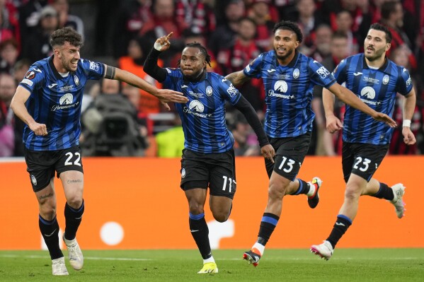Atalanta's Ademola Lookman celebrates after scoring his side's first goal during the Europa League final soccer match between Atalanta and Bayer Leverkusen at the Aviva Stadium in Dublin, Ireland, Wednesday, May 22, 2024. (AP Photo/Kirsty Wigglesworth)