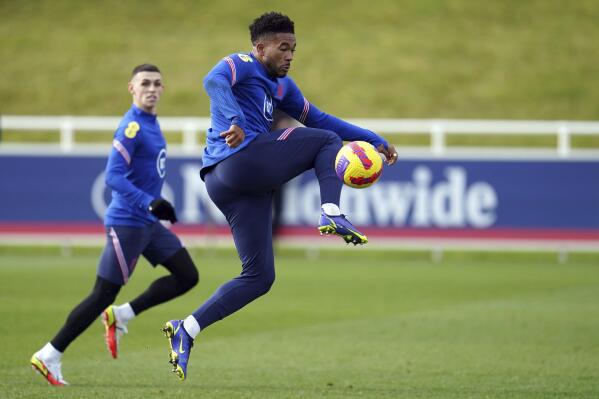 England's Reece James reaches for the ball during a training session ahead of the upcoming World Cup 2022 qualifying soccer match against Albania and San Marino, at St George's Park, Burton-upon-Trent, England, Tuesday, Nov. 9, 2021. (Nick Potts/PA via AP)