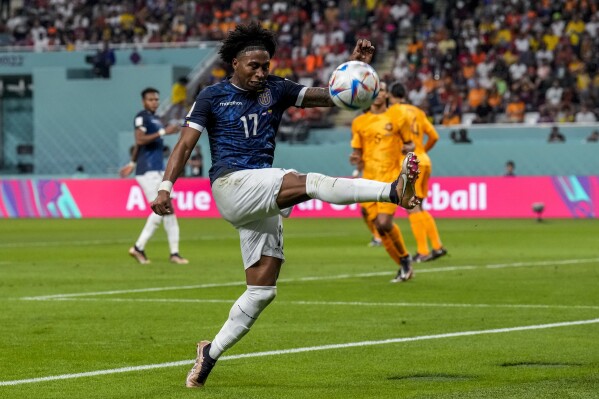 FILE - Ecuador's Angelo Preciado kicks the ball during the World Cup group A soccer match between Netherlands and Ecuador, at the Khalifa International Stadium in Doha, Qatar, Friday, Nov. 25, 2022. Ecuador defender Angelo Preciado has completed a transfer from Gent in Belgium to Czech champion Sparta Prague. Sparta said on Monday Preciado signed a several-year deal. No financial details were given. The 25-year-old played 59 league games for Gent since he joined it in 2021. (AP Photo/Natacha Pisarenko, File)