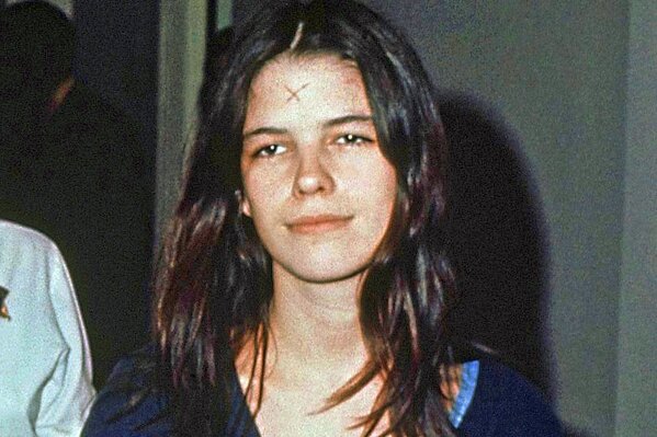 This March 29, 1971, photo shows Leslie Van Houten in a Los Angeles lockup. She didn't take part in the Tate killings but accompanied Charles Manson and others to the LaBianca home the next night where she held Rosemary LaBianca down with a pillowcase over her head as she and others stabbed her dozens of times. Van Houten, 69, has earned bachelor's and master's degrees in counseling while in prison and leads several prison programs to help rehabilitate fellow inmates. She has been recommended for parole three times but former Gov. Jerry Brown blocked her release each time. (AP Photo/File)