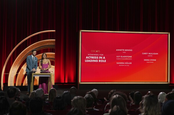 Jack Quaid, left, and Zazie Beetz speak during the 96th Academy Awards nominations announcement on Tuesday, Jan. 23, 2024, at the Samuel Goldwyn Theater in Beverly Hills, Calif. The 96th Academy Awards will take place on Sunday, March 10, 2024, in Los Angeles. (Photo by Jordan Strauss/Invision/AP)