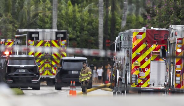 First responders work an active fire inside the Landmark Ranch Estates neighborhood on Wednesday, Jan. 3, 2024, in Southwest Ranches, Fla. Fire erscue crews alongside the Broward Sheriff's Office worked to put out a two-alarm fire at a home belonging to Miami Dolphins wide receiver Tyreek Hill inside the private neighborhood. (Matias J. Ocner/Miami Herald via AP)