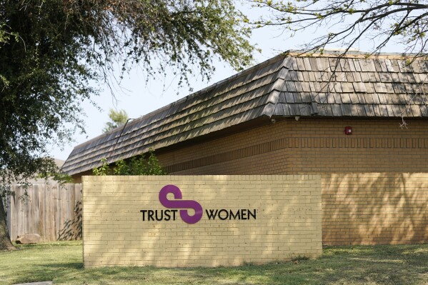 FILE - The Trust Women clinic is pictured Wednesday, Sept. 1, 2021, in Oklahoma City. A Kansas women's health clinic that has often served as the epicenter of conflict over abortion rights has temporarily stopped offering the procedure, setting off a scramble for services in one of the few states in the region allowing abortions. (AP Photo/Sue Ogrocki, File)