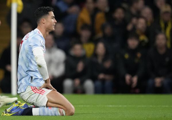 Manchester United's Cristiano Ronaldo reacts during the English Premier League soccer match between Watford and Manchester United at Vicarage Road, Watford, England, Saturday, Nov. 20, 2021. (AP Photo/Frank Augstein)