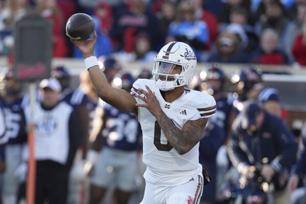 Mississippi State quarterback Michael Van Buren Jr. passes the ball against Mississippi during the first half of an NCAA college football game, Friday, Nov. 29, 2024, in Oxford, Miss. (AP Photo/Rogelio V. Solis)
