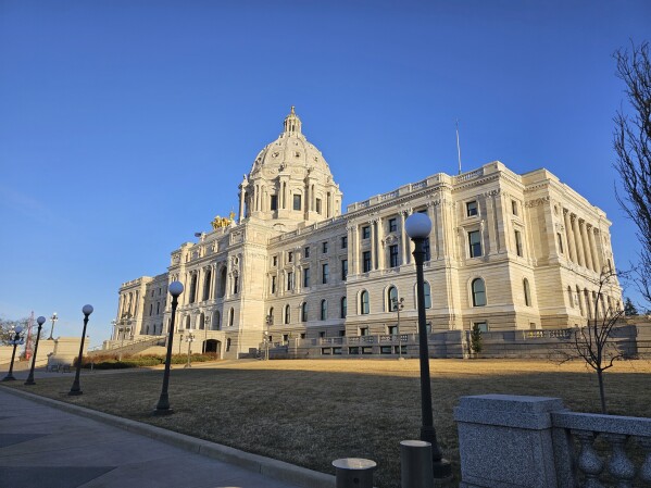 Morning light strikes the Minnesota State Capitol in St. Paul on Wednesday, March 20, 2024. The Minnesota Legislature returns from its Easter break on Tuesday with lots of bills in the pipeline. They include a myriad of low-profile proposals but several high-profile pieces of legislation are in the mix, ranging from cannabis and sports betting, to rights for trans people, to maintaining the state's roads and bridges. (AP Photo/Steve Karnowski)