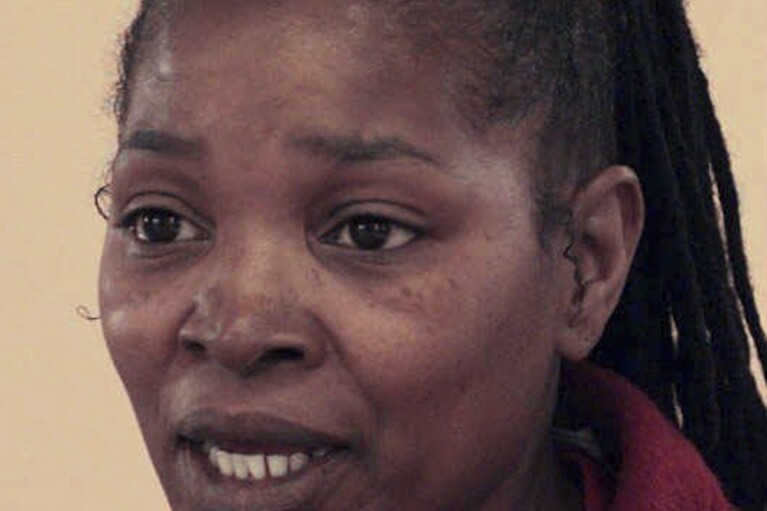 FILE - Betty Tyson, answers questions during a jailhouse interview, June 13, 1997 at Bedford Hills Correctional facility in Bedford Hills, N.Y. Tyson, the woman who spent 25 years in prison for a 1973 murder until being exonerated on the basis of new evidence, has died in upstate New York, her sister said Wednesday, Aug. 23, 2023. (Shawn Dowd/Democrat and Chronicle via AP, File)