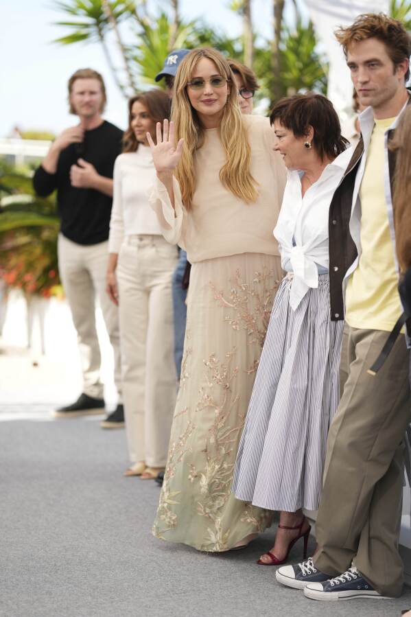 Jennifer Lawrence, from left, director Lynne Ramsay and Robert Pattinson pose for photographers at the photo call for the film 'Die, My Love' at the 78th international film festival, Cannes, southern France, Sunday, May 18, 2025. (Photo by Scott A Garfitt/Invision/AP)