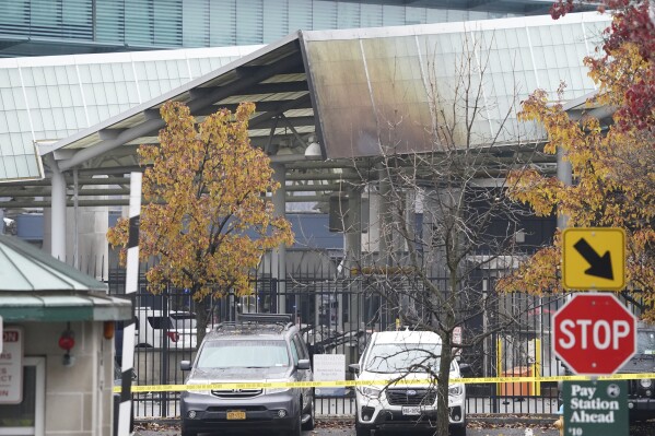 Fire damage is visible to the customs plaza structure at the Rainbow Bridge border crossing, Wednesday, Nov. 22, 2023, in Niagara Falls, N.Y. The border crossing between the U.S. and Canada has been closed after a vehicle exploded at a checkpoint on a bridge near Niagara Falls. The FBI's field office in Buffalo said in a statement that it was investigating the explosion on the Rainbow Bridge, which connects the two countries across the Niagara River. (Derek Gee/The Buffalo News via AP)