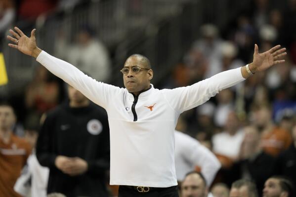 Texas head coach Rodney Terry reacts in the second half of an Elite 8 college basketball game against Miami in the Midwest Regional of the NCAA Tournament Sunday, March 26, 2023, in Kansas City, Mo. (AP Photo/Charlie Riedel)