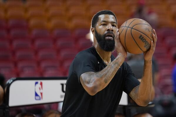 FILE - Miami Heat forward Markieff Morris warms up before an NBA basketball game against the Toronto Raptors, Jan. 17, 2022, in Miami. Morris, who has not played since early November, is expecting to return to the Heat lineup in the coming days. (AP Photo/Lynne Sladky, File)