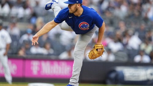 Chicago Cubs' Jameson Taillon pitches during the first inning of a baseball game against the New York Yankees, Friday, July 7, 2023, in New York. (AP Photo/Frank Franklin II)