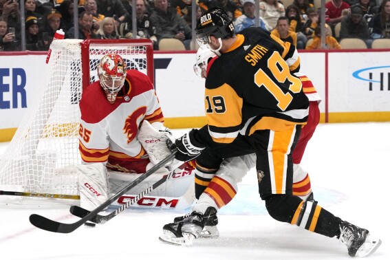 Malkin's tip lifts Penguins past Rangers in 3OTs in Game 1