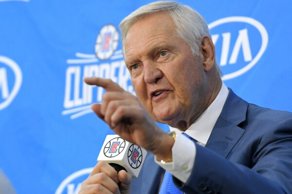 FILE - Jerry West speaks during a news conference to introduce him as an advisor to the Los Angeles Clippers, in Los Angeles, June 19, 2017. Jerry West, who was selected to the Basketball Hall of Fame three times in a storied career as a player and executive and whose silhouette is considered to be the basis of the NBA logo, died Wednesday morning, June 12, 2024, the Los Angeles Clippers announced. He was 86.(AP Photo/Mark J. Terrill, File)