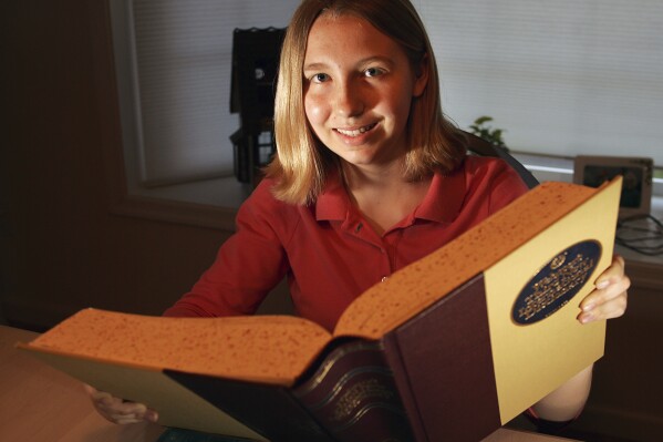 Katharine "Kerry" Close, 13, poses at home in Spring Lake, N.J., May 24, 2006. (AP Photo/Tim Larsen, File)