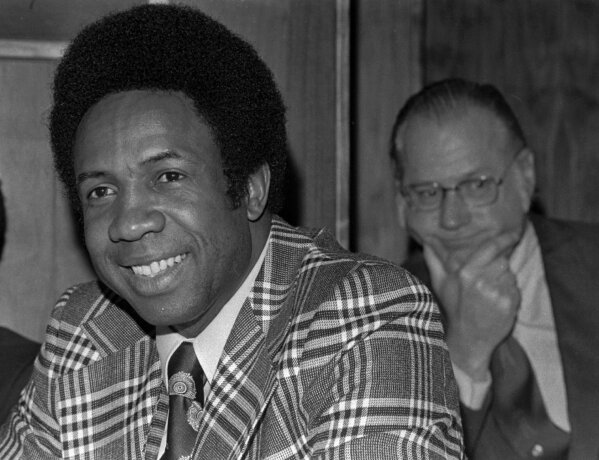
              FILE - This June 19, 1996, file photo shows Frank Robinson at a news conference in...
