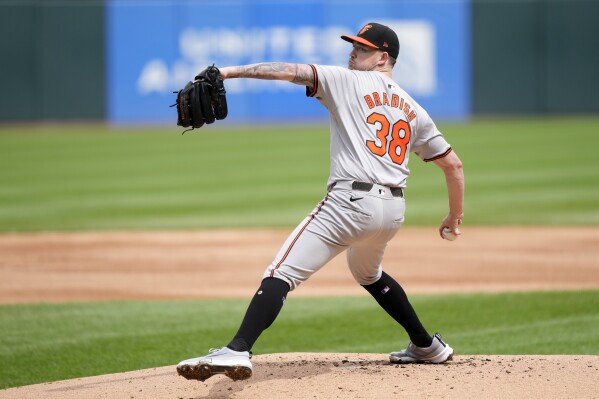 Baltimore Orioles starting pitcher Kyle Bradish delivers during the first inning of a baseball game against the Chicago White Sox on Sunday, May 26, 2024, in Chicago. (AP Photo/Charles Rex Arbogast)