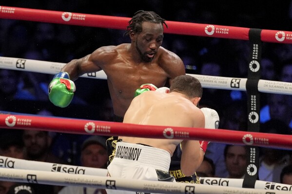 Terence Crawford becomes 4-division champion by defeating Israil Madrimov  by unanimous decision | AP News