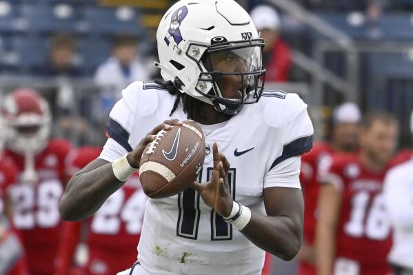 UConn quarterback Zion Turner looks to throw during the first half of an NCAA college football game against Fresno State at Pratt & Whitney Stadium at Rentschler Field in East Hartford, Conn., Saturday, Oct. 1, 2022. (Jessica Hill/Hartford Courant via AP)