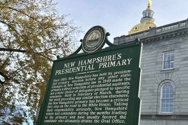 A historical marker displayed outside the Statehouse in Concord, New Hampshire, on Nov. 15, 2023, describes the history of the state's first-in-the-nation presidential primary. (AP Photo/Holly Ramer)