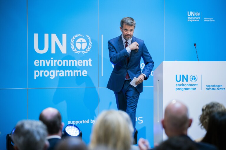 FILE - Denmark's Crown Prince Frederik walks on stage, during the opening of the United Nation's new Climate Centre, The United Nations Environment Program (UNEP), in Copenhagen, Denmark, Tuesday, April 26, 2022. (Martin Sylvest/Ritzau Scanpix via AP, File)