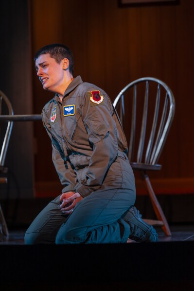 This image released by the Washington National Opera shows mezzo-soprano Emily D'Angelo as a fighter pilot in "Grounded," an opera having its world premiere at the Washington National Opera. (Scott Suchman/Washington National Opera via AP)