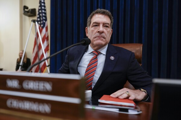 FILE - House Homeland Security Committee Chairman Mark Green, R-Tenn., arrives to begin the impeachment of Secretary of Homeland Security Alejandro Mayorkas over the crisis at the U.S.-Mexico border, Jan. 30, 2024, at the Capitol in Washington. On Wednesday, Feb. 14, 2024, Green announced that he won't run for a fourth term, pointing to the recent impeachment of Mayorkas as among the reasons it was “time for me to return home.” (AP Photo/J. Scott Applewhite, File)