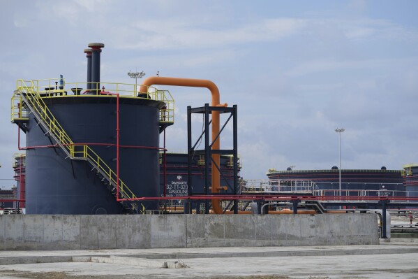 FILE - A view of oil installations at the Dangote refinery during the opening ceremony in Lagos, Nigeria, Monday, May 22, 2023. Nigeria’s Dangote Petroleum Refinery, which is Africa’s biggest, says it has begun production, starting with diesel and aviation fuel. This brings to an end a yearslong wait for a plant that analysts said Monday, Jan. 15, 2024 could boost local and regional refining capacity in a region heavily reliant on imported refined products. (AP Photo/Sunday Alamba, File)