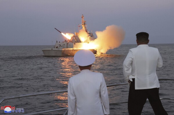 In this undated photo provided on Monday, Aug. 21, 2023, by the North Korean government, North Korean leader Kim Jong Un, right, observes what it says the test-firing of strategic cruise missiles. Independent journalists were not given access to cover the event depicted in this image distributed by the North Korean government. The content of this image is as provided and cannot be independently verified. Korean language watermark on image as provided by source reads: "KCNA" which is the abbreviation for Korean Central News Agency. (Korean Central News Agency/Korea News Service via AP)