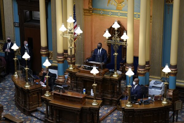 Michigan Lt. Gov. Garlin Gilchrist opens the state's Electoral College session at the state Capitol, Monday, Dec. 14, 2020 in Lansing, Mich. (AP Photo/Carlos Osorio, Pool)