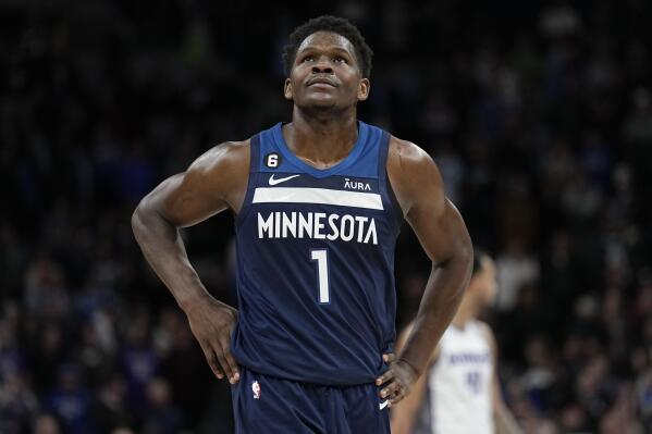 Minnesota Timberwolves guard Anthony Edwards (1) reacts during the final seconds of overtime during an NBA basketball game against the Minnesota Timberwolves, Monday, Jan. 30, 2023, in Minneapolis. The Minnesota Timberwolves lost 118-111 to the Sacramento Kings. (AP Photo/Abbie Parr)